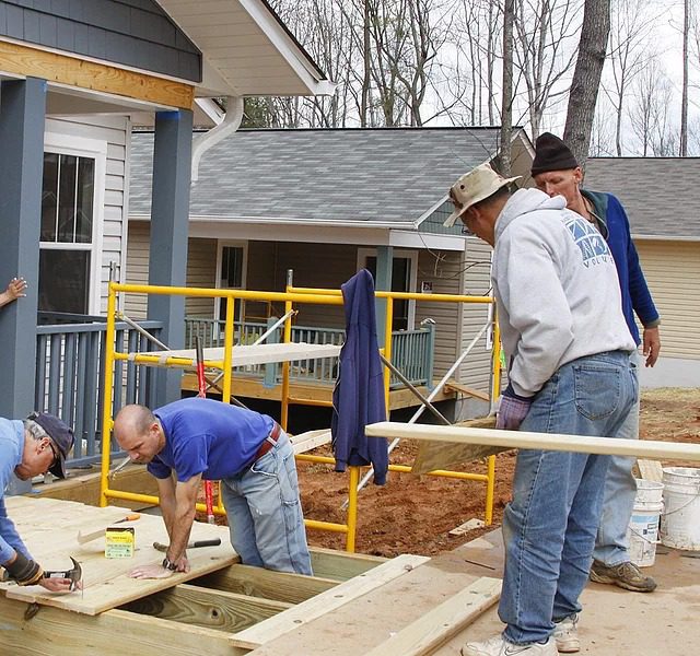 Workers Building A Deck